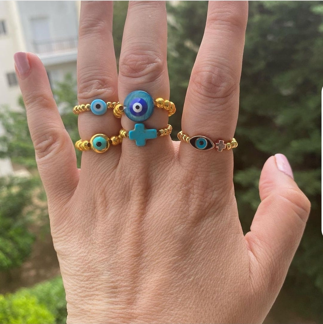 Evil eye and cross stretch rings